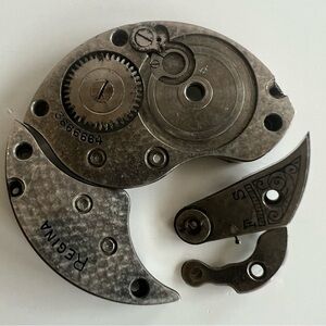 Old pocket watch movement parts